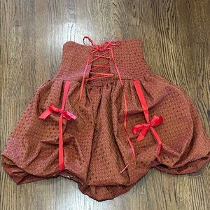 Red Corset-Style Skirt with Bow Accents